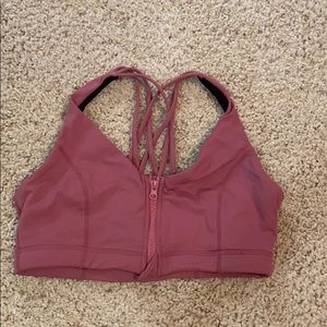 Pink zip front sports bra